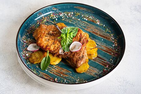 Кусок свинины на гвозде