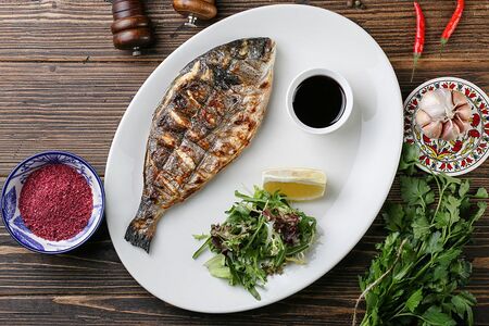 Дорадо на вертеле