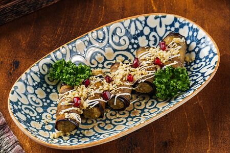 Рулетики из баклажанов с ореховой начинкой