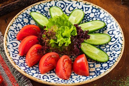 Огурцы и помидоры бакинские