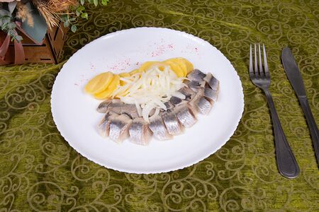 Сельдь с картофелем