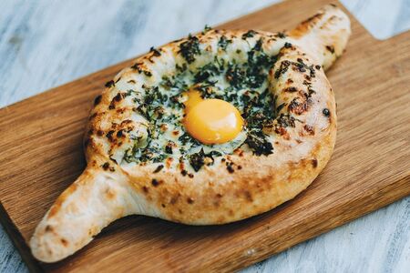 Хачапури по-аджарски со шпинатом и сыром