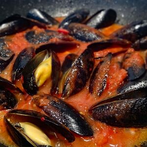 Мидии в томатном соусе