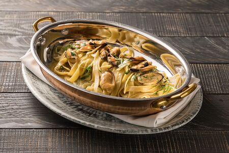 Лингвини с мидиями, которые вернулись из Индии