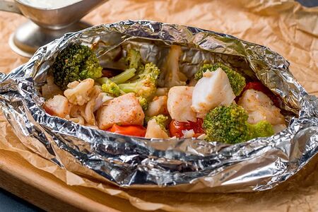 Судак с овощами