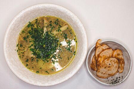 Бульон с индейкой, лапшой и яйцом