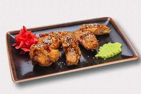 Куриные крылья в кисло-сладком соусе