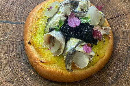 Картофельная шаньга с очерской тюлькой