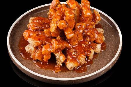 Ломтики свинины в сладком соусе