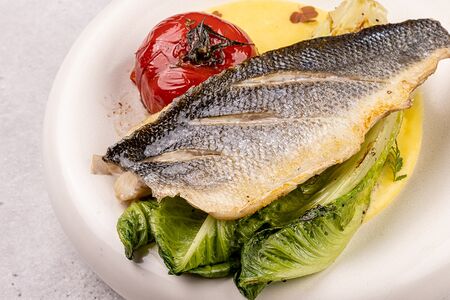 Сибас на подушечке романо