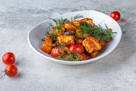 Курица с запеченными овощами