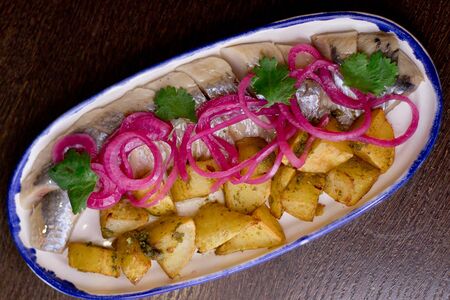 Сельдь с картофелем