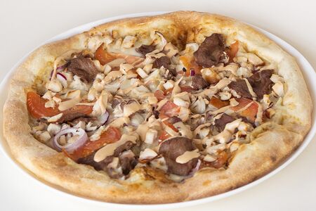 Пицца с говядиной