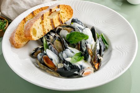 Мидии в сливочном соусе