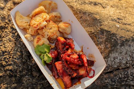 Осьминог су-вид с цветной капустой