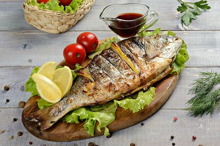 Дорада на мангале