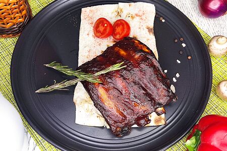 Свиные ребрышки в кисло-сладком соусе