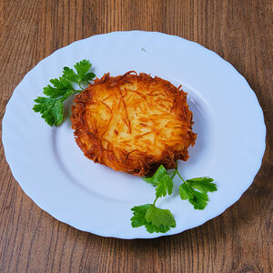 Отбивная в картофельной стружке