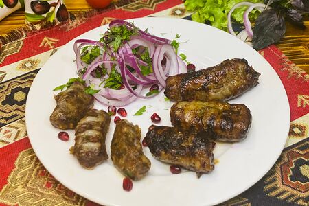 Говяжья печень в бараньей сетке