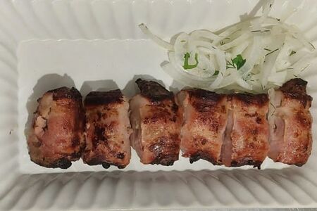 Телячья печень в беконе