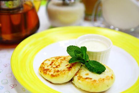 Сырники ванильные со сметаной