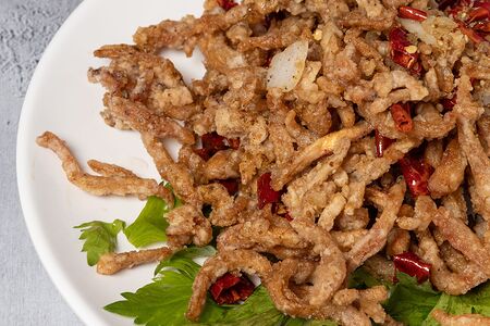 Сухой жареный кальмар с перцем