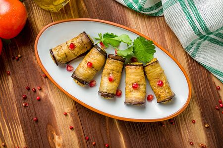 Рулетики из баклажанов с орехами