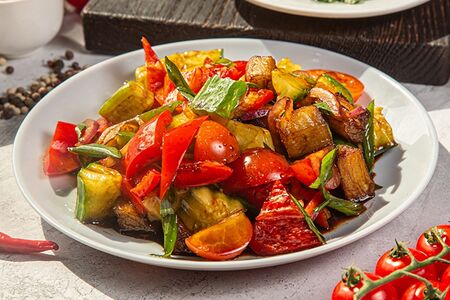 Баклажановый теплый салат