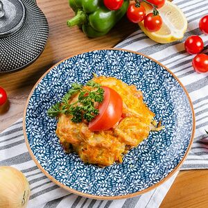 Белая рыба, запеченная с овощами