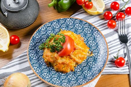 Белая рыба, запеченная с овощами