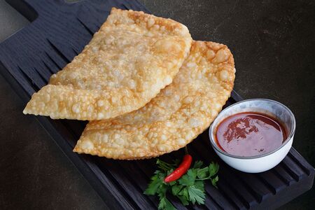 Чебуреки с двумя видами сыра