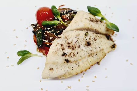 Тилапия с овощами