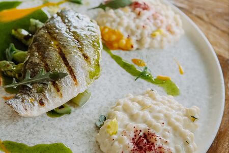 Филе дорадо с птитимом и пармезаном