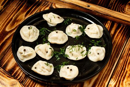 Пельмени со свининой и говядиной