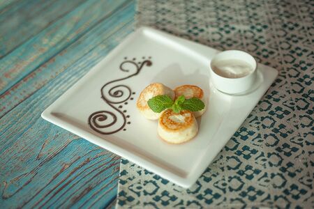 Творожные сырники с кубанской сметаной