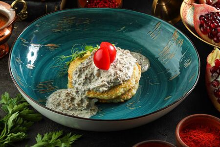 Драники с грибным соусом