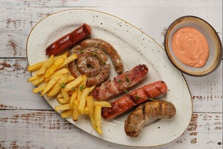 Колбаски на мангале