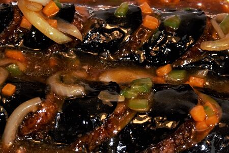 Баклажаны на чугуне фаршированные