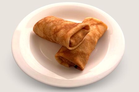 Блинчики фаршированные ветчиной и сыром