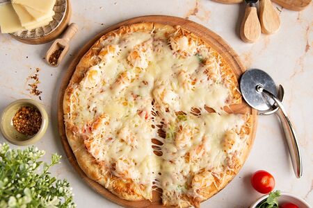 Пицца с морепродуктами и соусом Том Ям