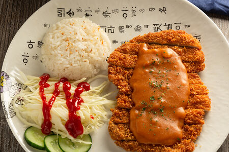 Тонкас-cвинoй шницель с рисом