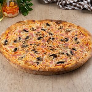 Пицца с ветчиной и грибами