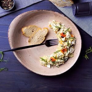 Теплый салат с копченой зубаткой