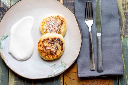 Сырники со сметаной