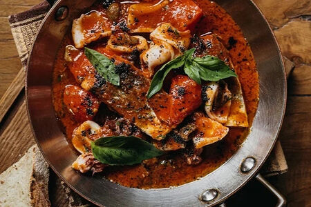 Дорадо Гуацетто с кальмаром