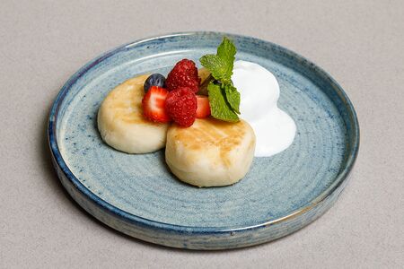 Сырники со сметаной