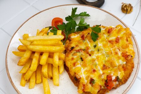 Куриная отбивная под сыром