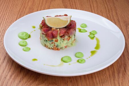 Оливье с тартаром из тунца и соусом васаби