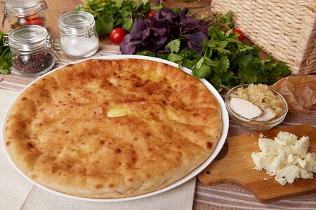 Осетинский пирог с курицей, осетинским сыром и капустой