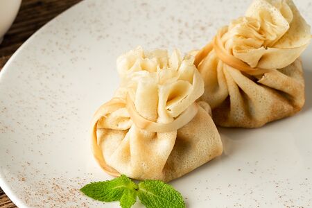 Блины с курицей и грибами в сливочном соусе